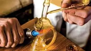 glass vessel heated by small hand torch